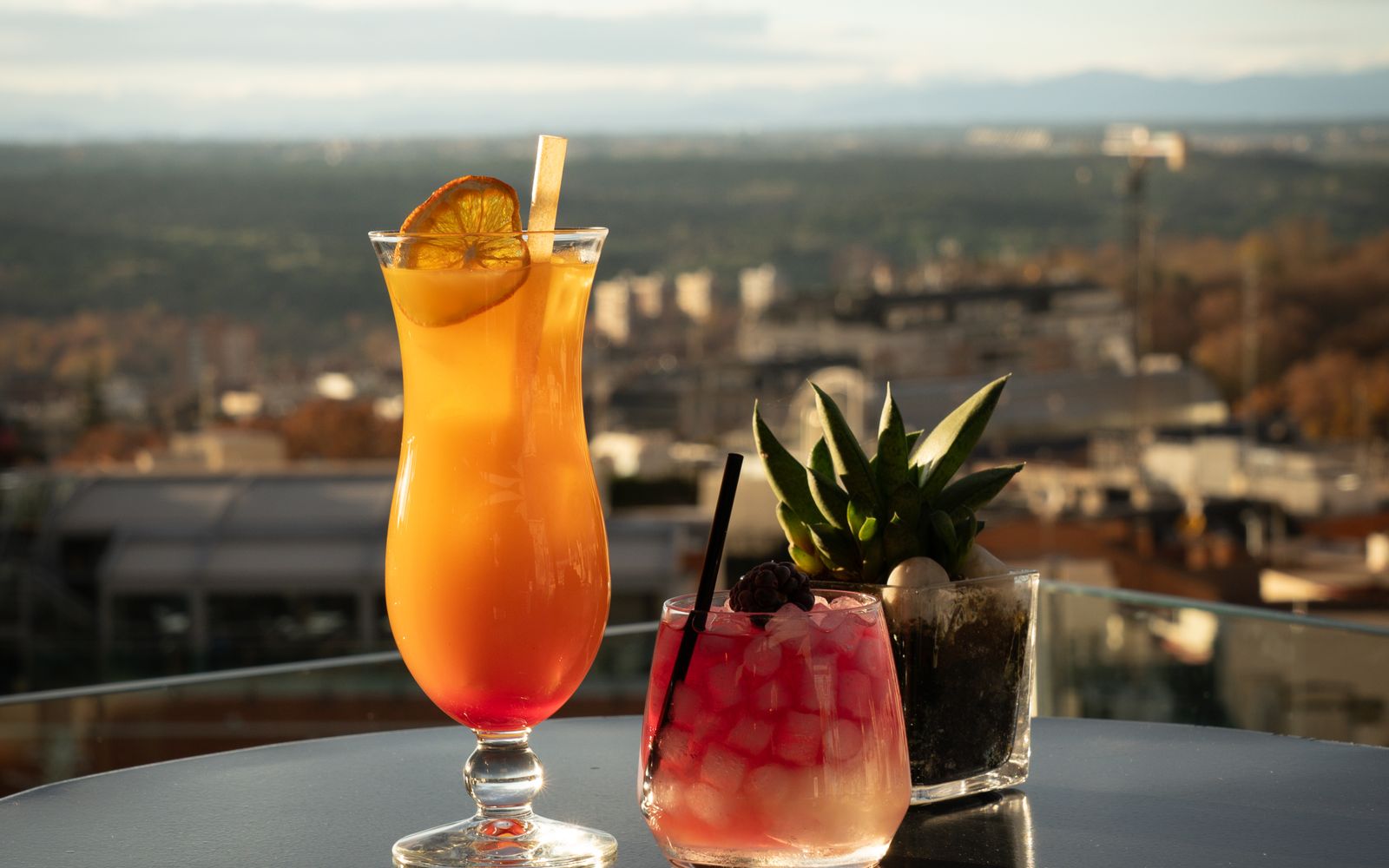 A rooftop bar at sunset
