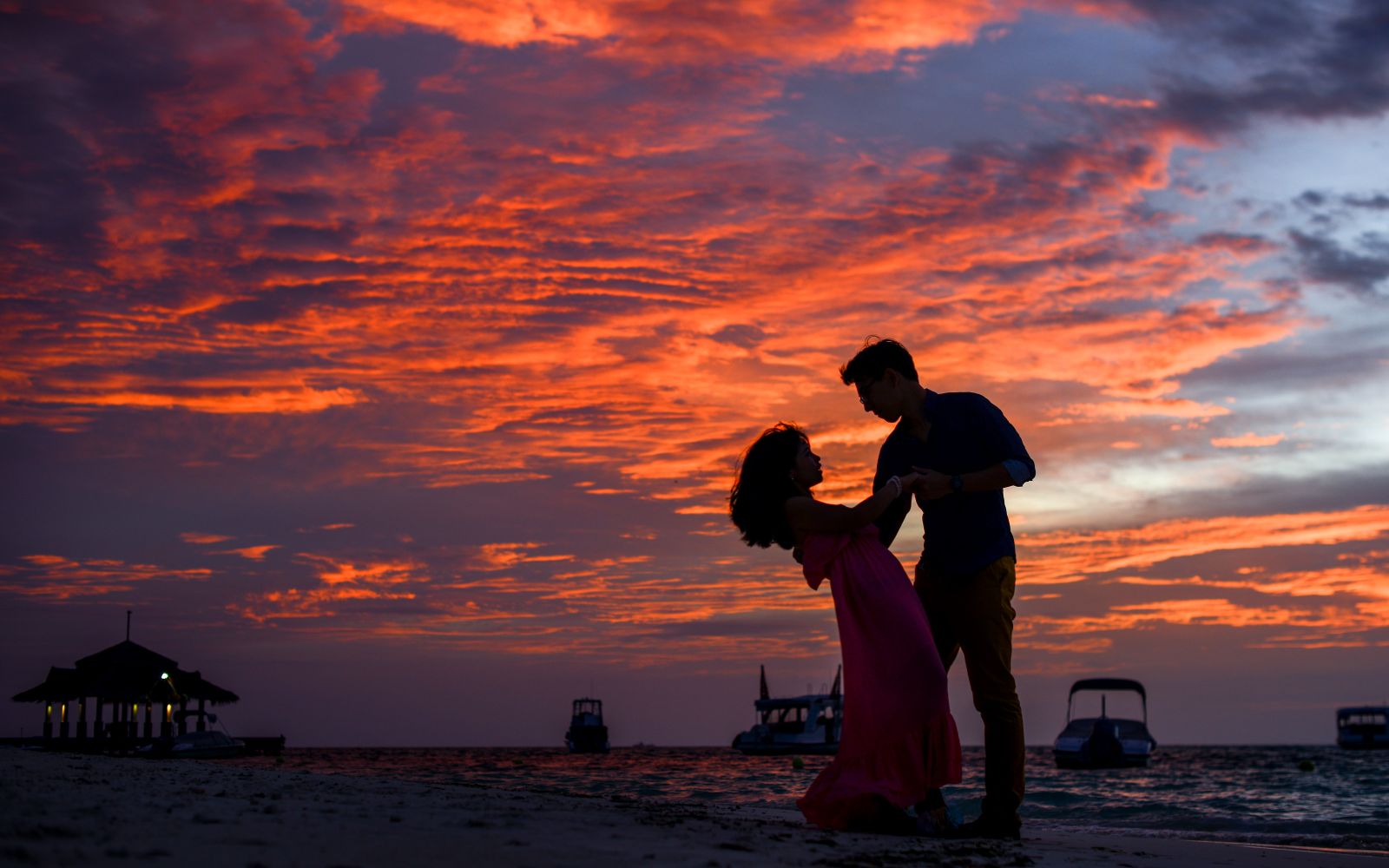 A couple watching the sunset in Cabo