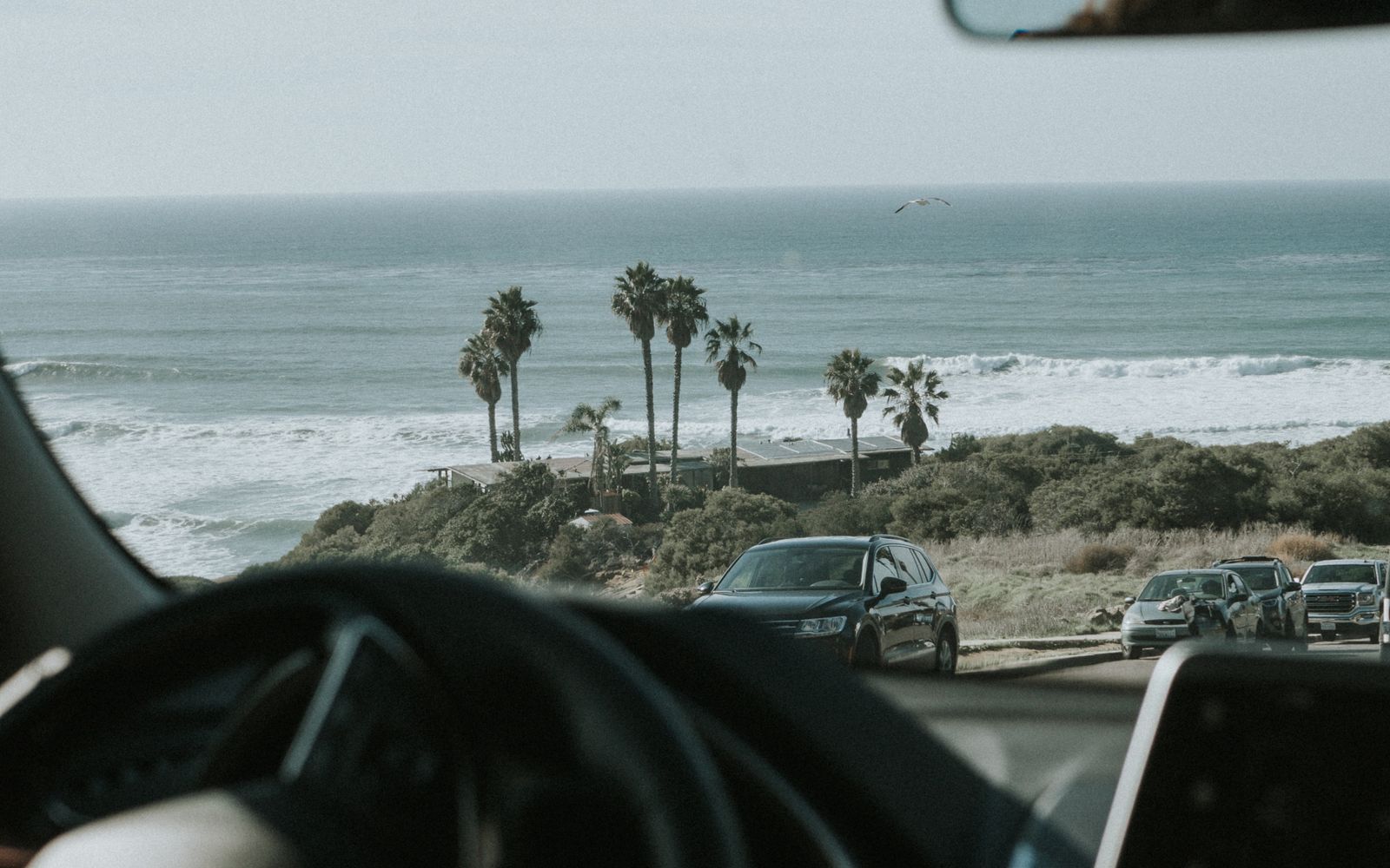 A rental car on an open coastal road