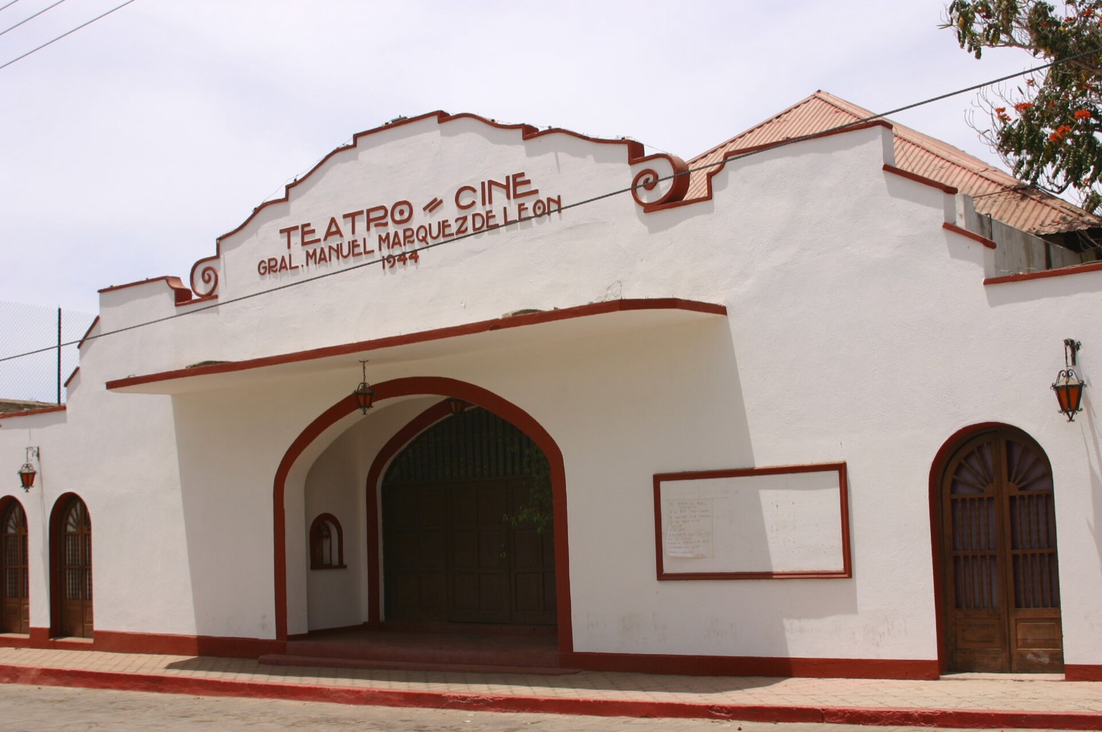 White 1944 Teatro Cine General Manuel Márquez de León building with red trim in historic Todos Santos