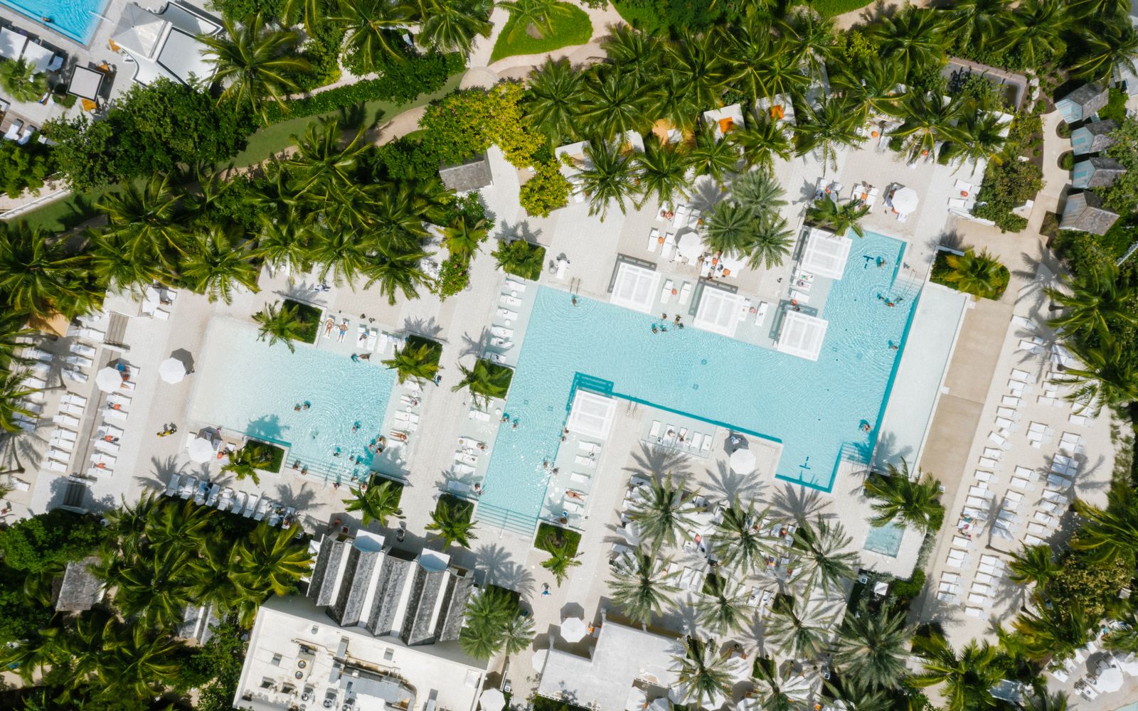 A resort and pool overlooking the sea
