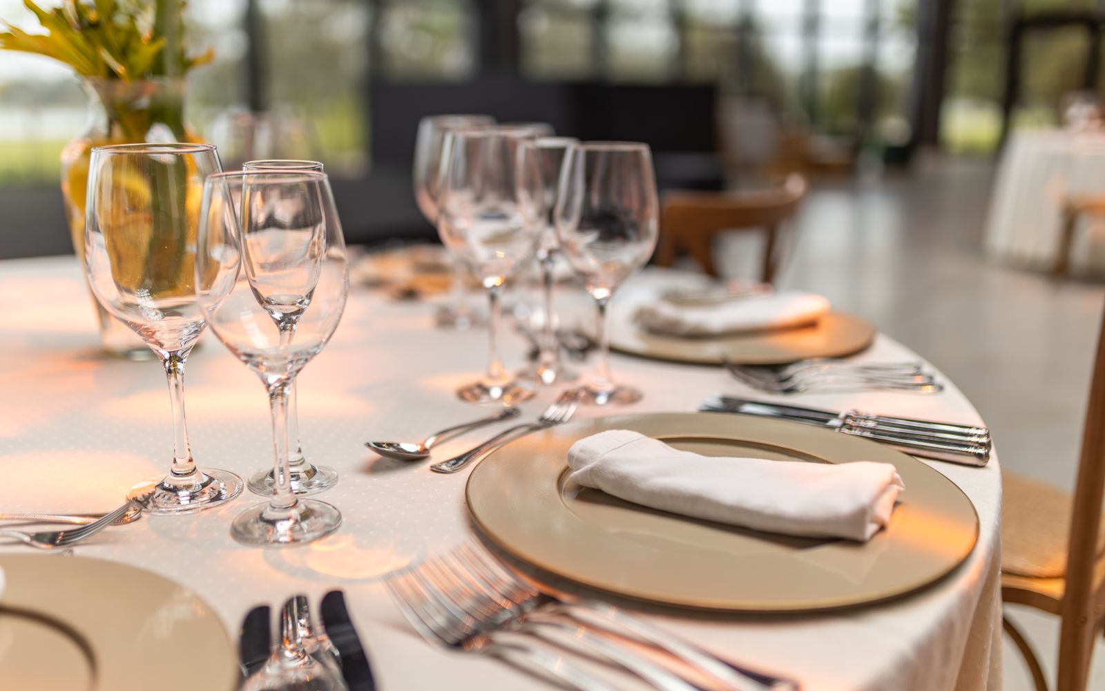 A restaurant table set for dinner
